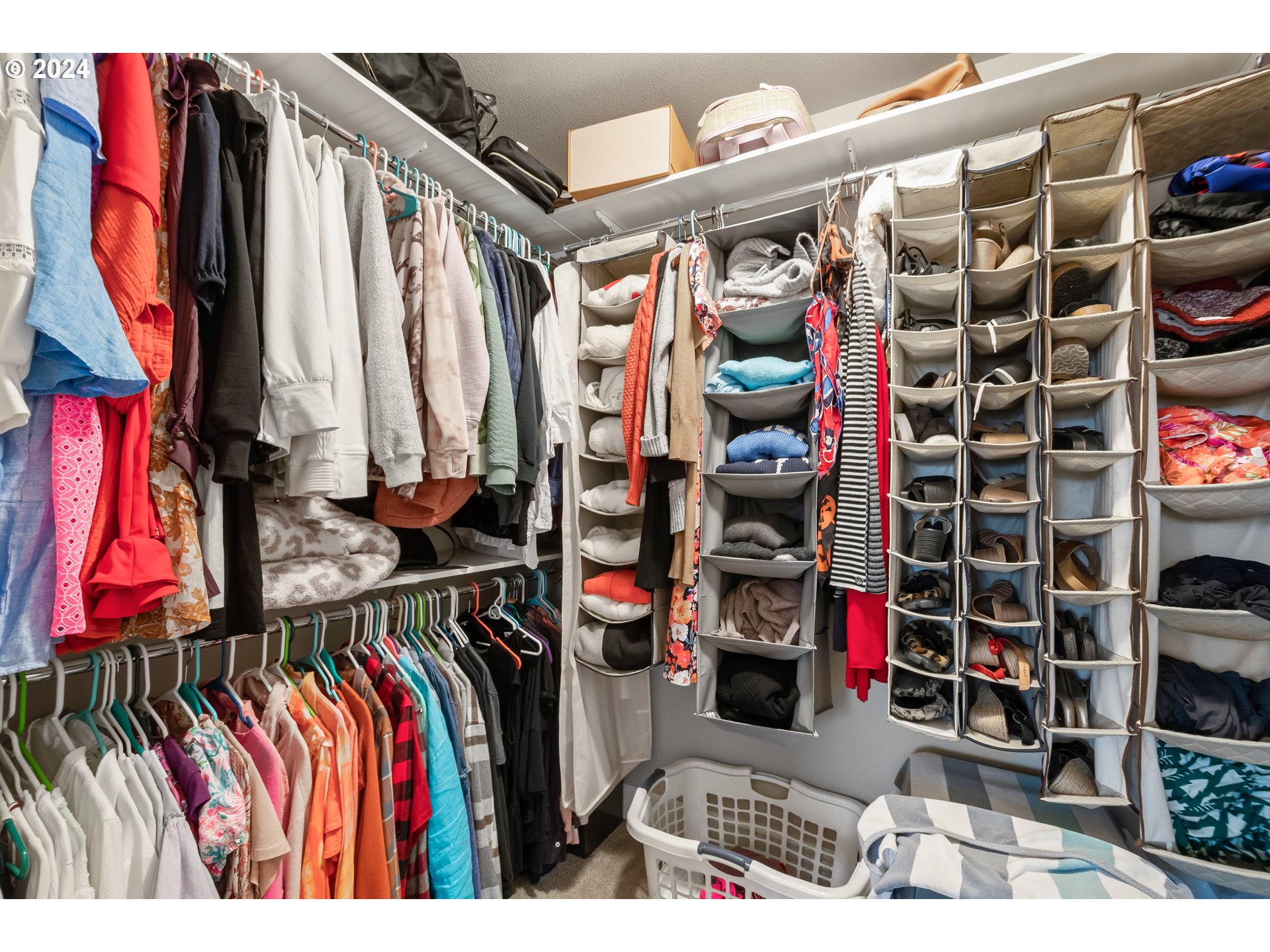 2804 Northeast 167th Circle Ridgefield, WA 98642 - Photo 19 of 36 a view of walk in closet with clothes