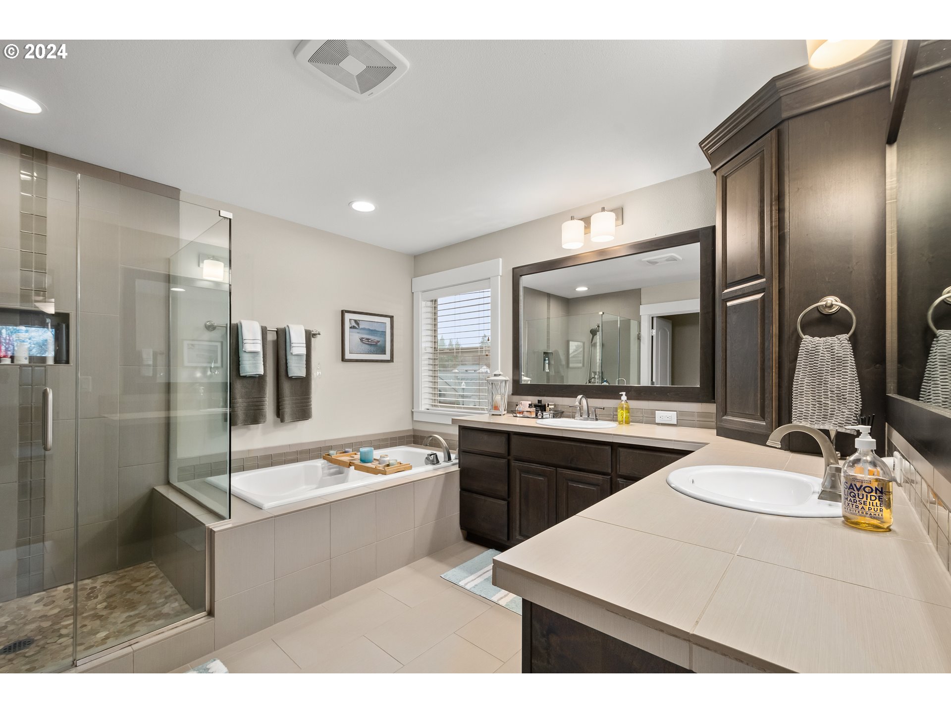 2804 Northeast 167th Circle Ridgefield, WA 98642 - Photo 20 of 36 a large white kitchen with a sink and refrigerator