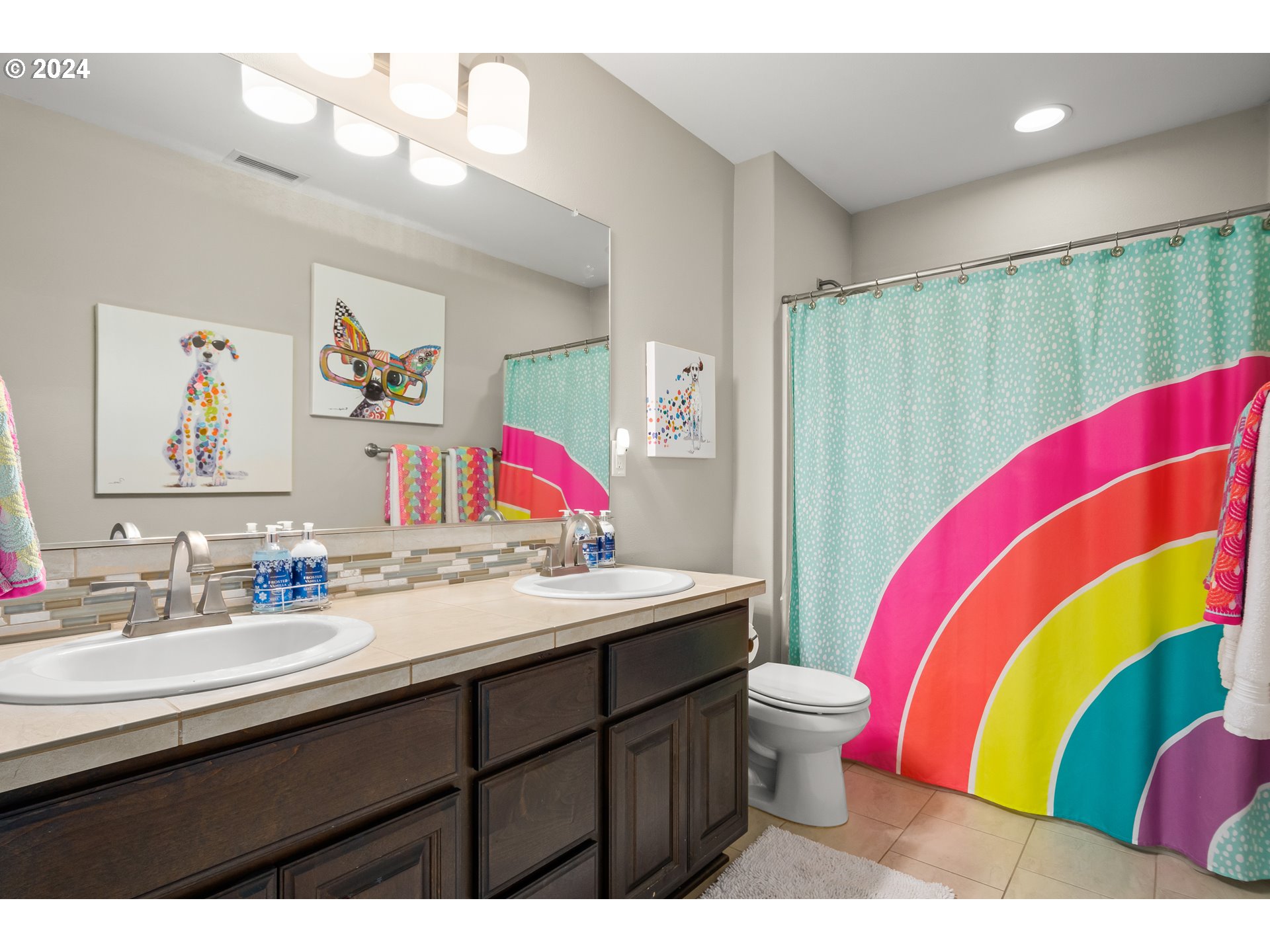 2804 Northeast 167th Circle Ridgefield, WA 98642 - Photo 26 of 36 a bathroom with a sink vanity mirror and toilet
