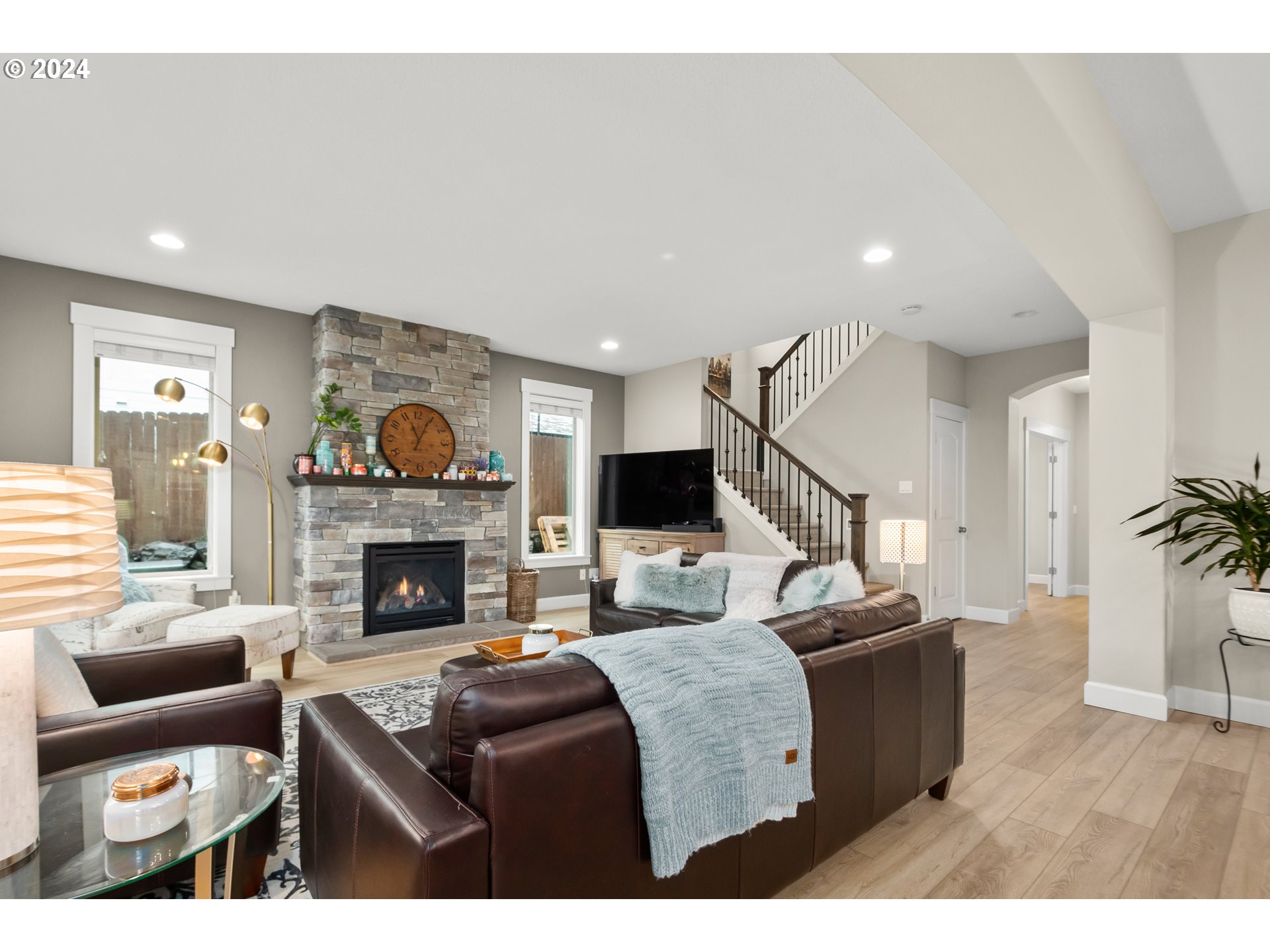 2804 Northeast 167th Circle Ridgefield, WA 98642 - Photo 5 of 36 a living room with furniture and a fireplace