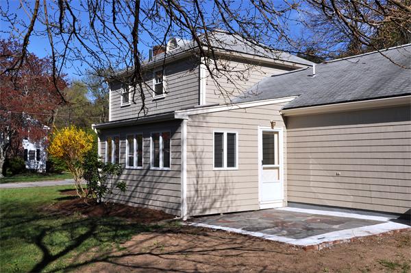 36 Coolidge Road Milton, MA 02186 - Photo 7 of 12 a view of a house with a yard