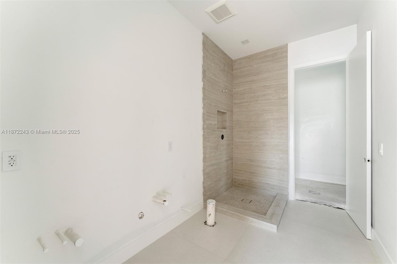 8620 Southwest 112th Street Miami, FL 33156 - Photo 12 of 22 a bathroom with a glass shower door