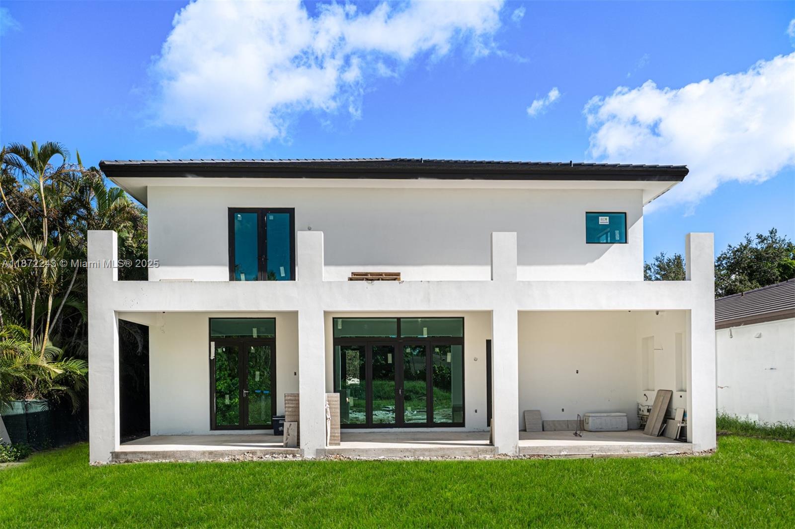 8620 Southwest 112th Street Miami, FL 33156 - Photo 21 of 22 a view of a house with a yard