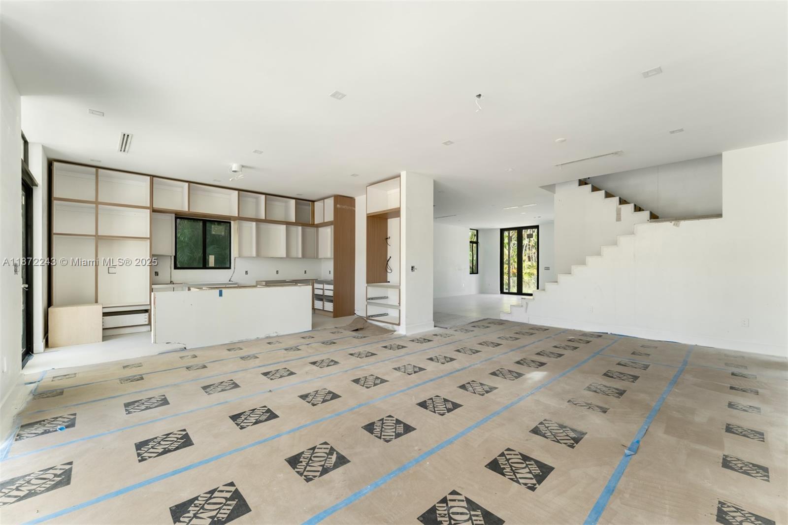 8620 Southwest 112th Street Miami, FL 33156 - Photo 5 of 22 a bedroom with a large bed and a flat screen tv