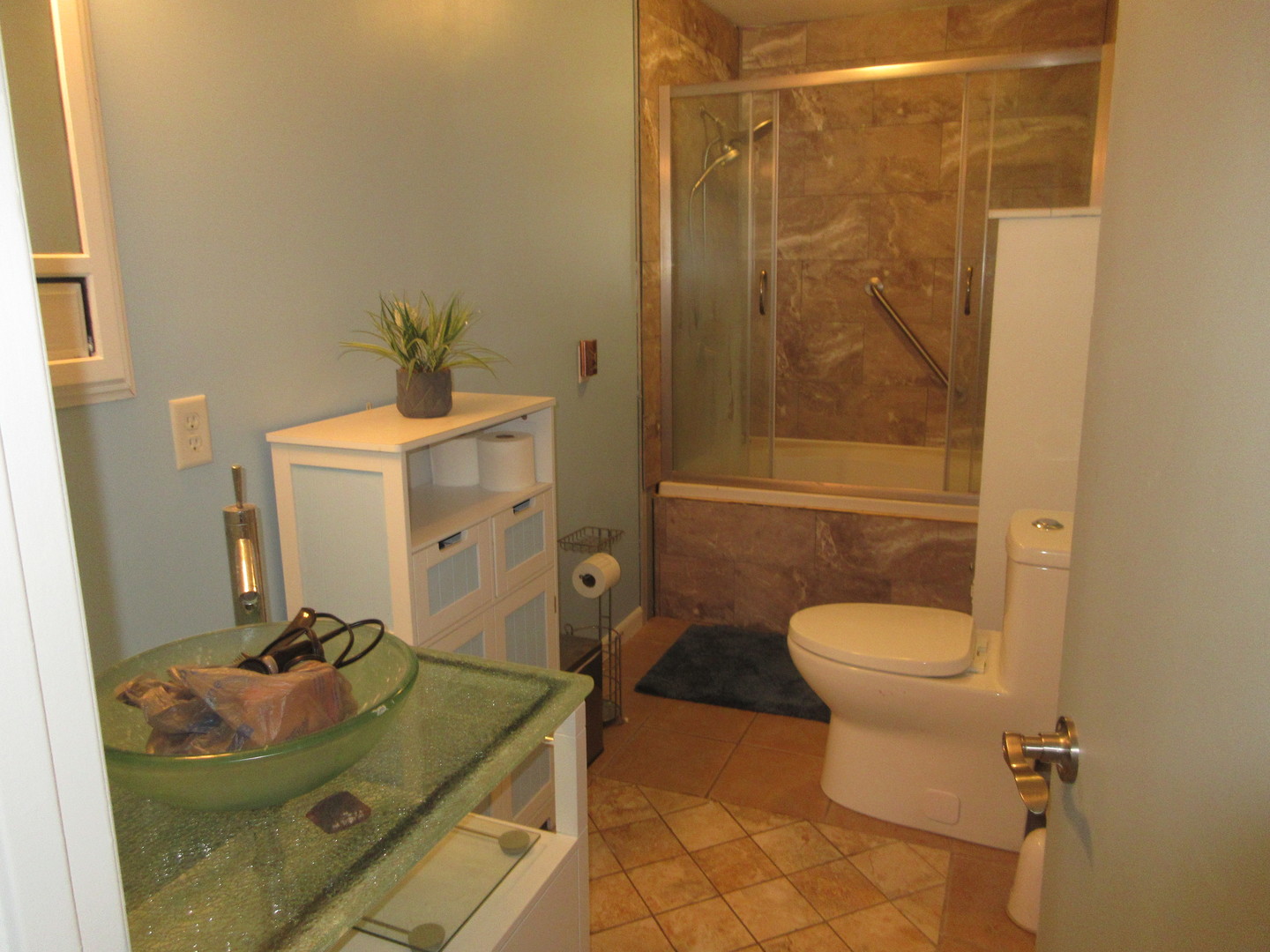 20172 Prophet Road Prophetstown, IL 61277 - Photo 13 of 32 a bathroom with a sink a toilet and shower