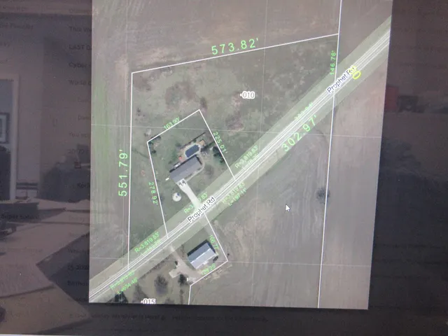 a view of a field with clear sky