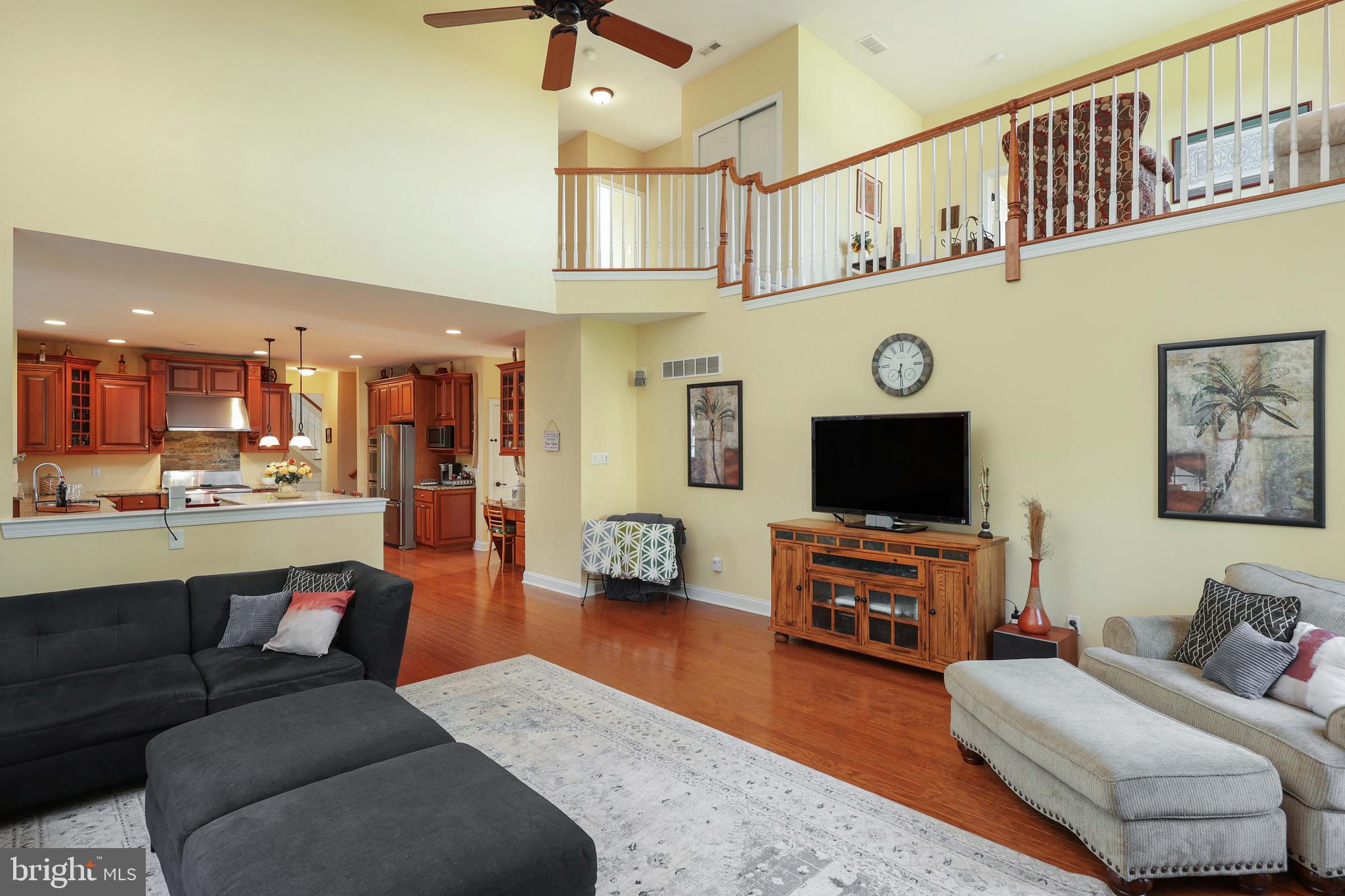 15 Manchester Court Columbus, NJ 08022 - Photo 21 of 80 a living room with furniture and a flat screen tv