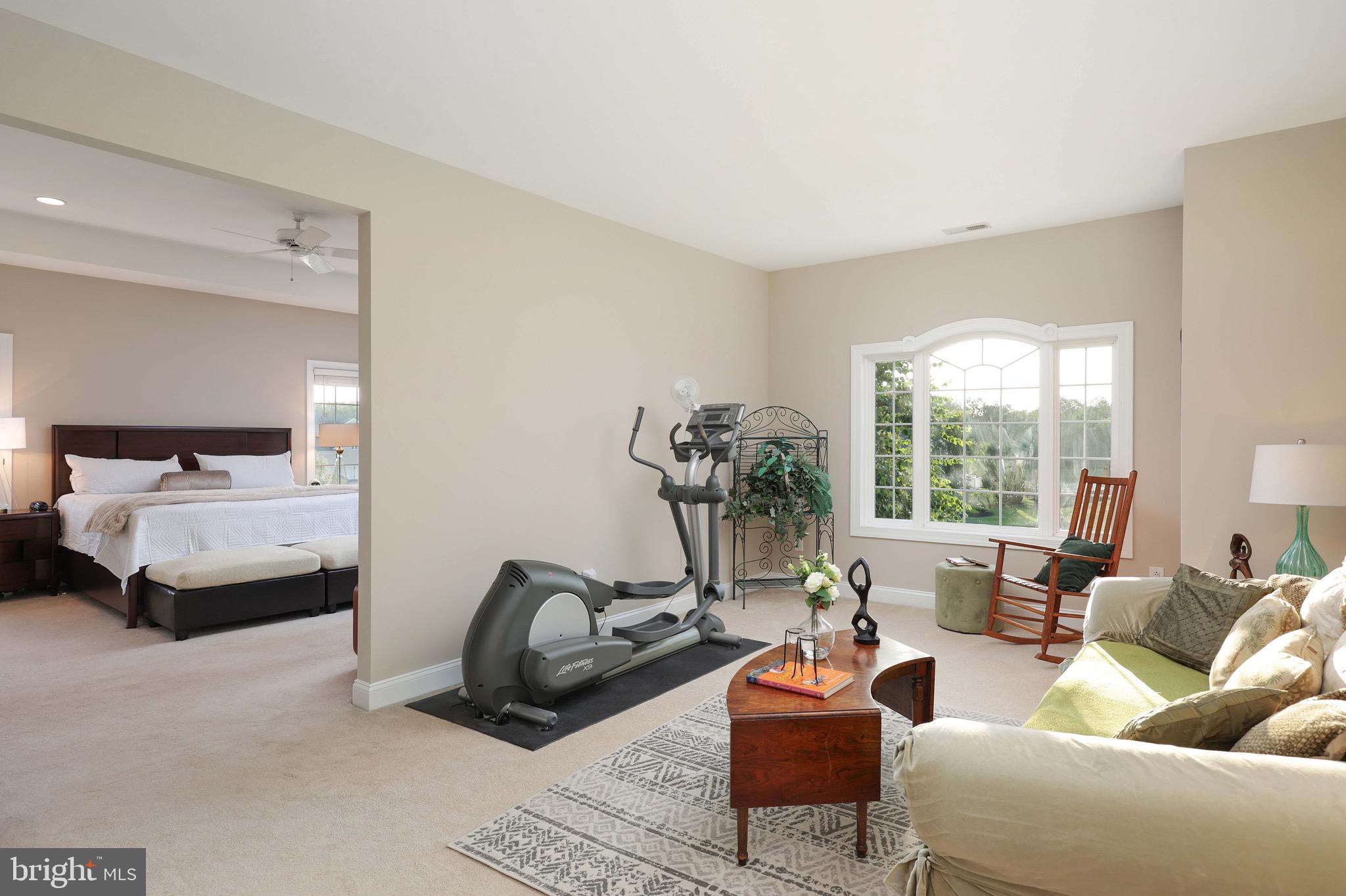 15 Manchester Court Columbus, NJ 08022 - Photo 25 of 80 a living room with furniture a large window and a potted plant on table