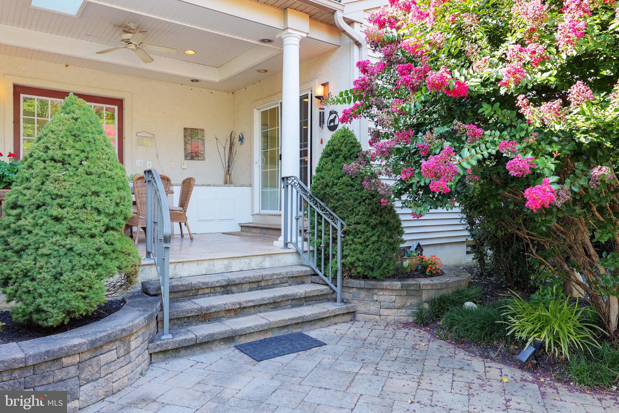15 Manchester Court Columbus, NJ 08022 - Photo 37 of 80 a view of a house with flower plants