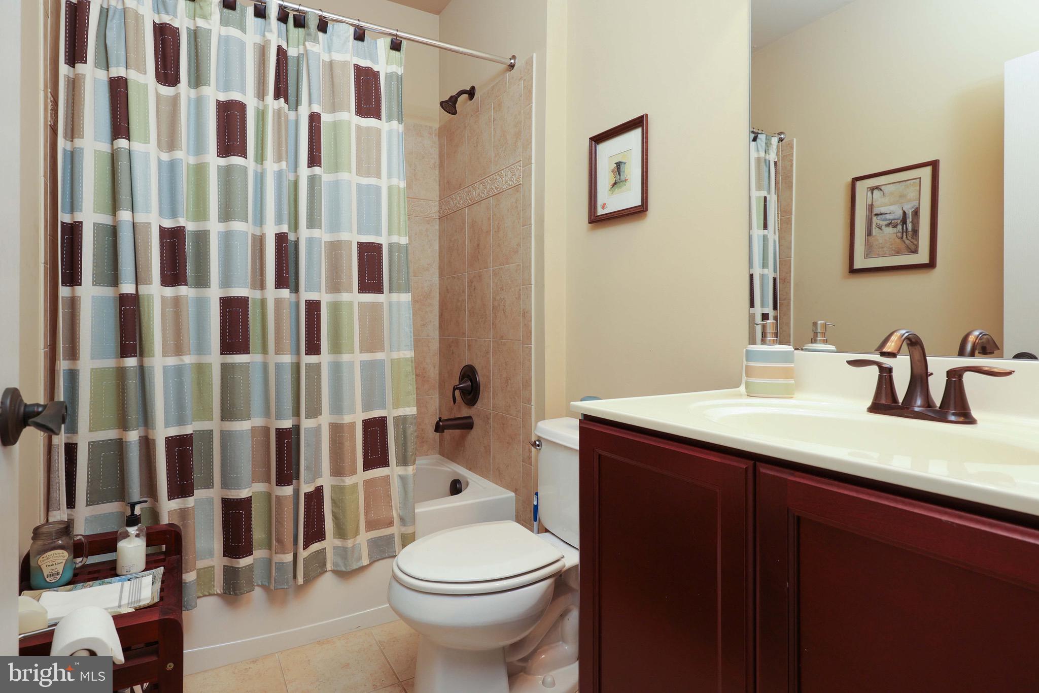 15 Manchester Court Columbus, NJ 08022 - Photo 51 of 80 a bathroom with a sink toilet and shower