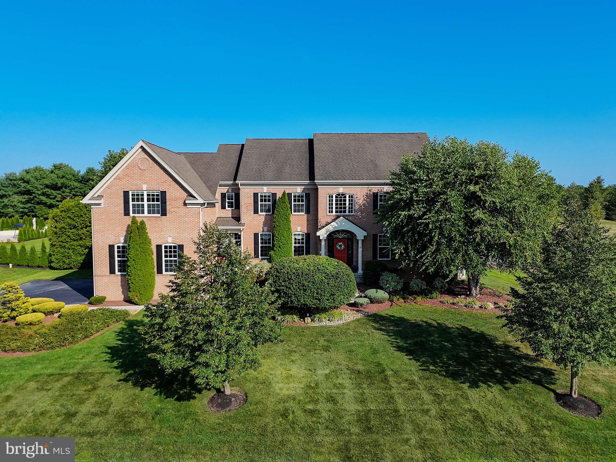 15 Manchester Court Columbus, NJ 08022 - Photo 59 of 80 a front view of a house with a yard