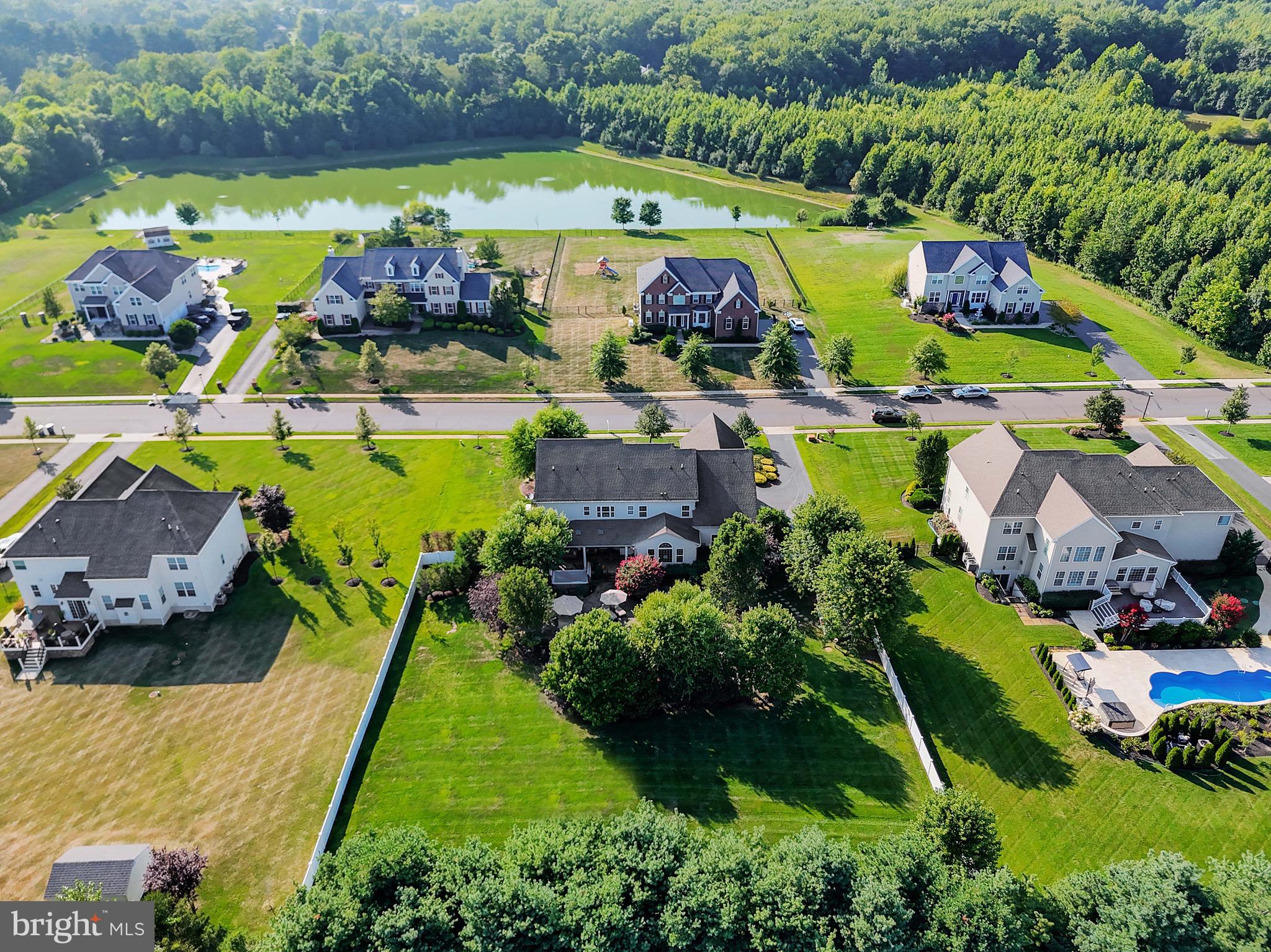 15 Manchester Court Columbus, NJ 08022 - Photo 65 of 80 an aerial view of a house with a swimming pool yard and outdoor seating