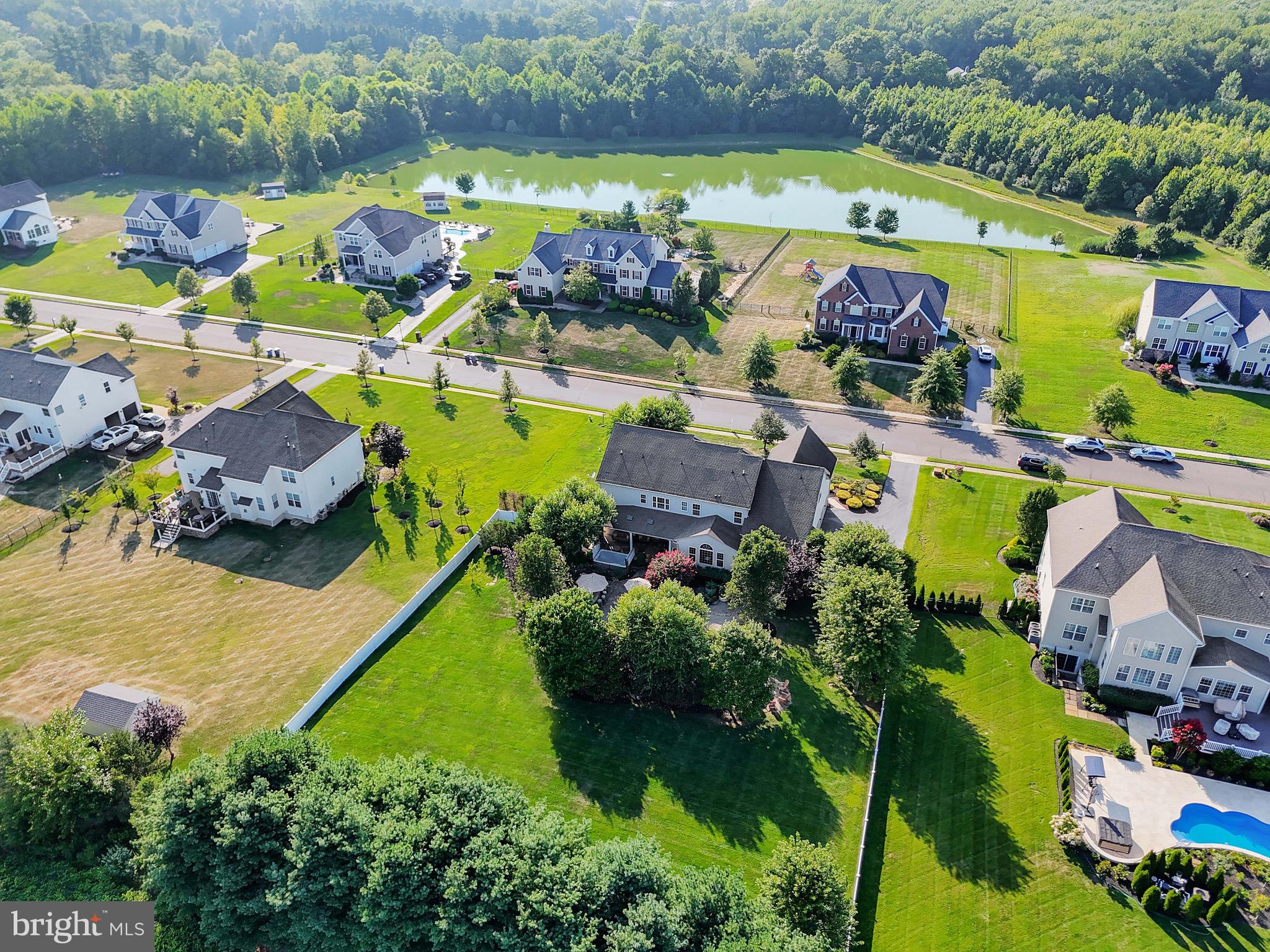 15 Manchester Court Columbus, NJ 08022 - Photo 66 of 80 an aerial view of a house with a swimming pool yard and outdoor seating