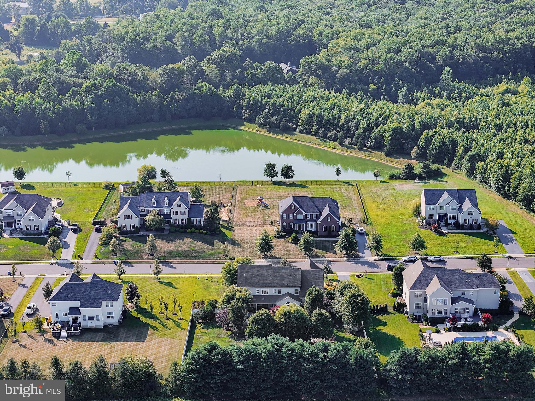 15 Manchester Court Columbus, NJ 08022 - Photo 74 of 80 an aerial view of a swimming pool patio and outdoor seating