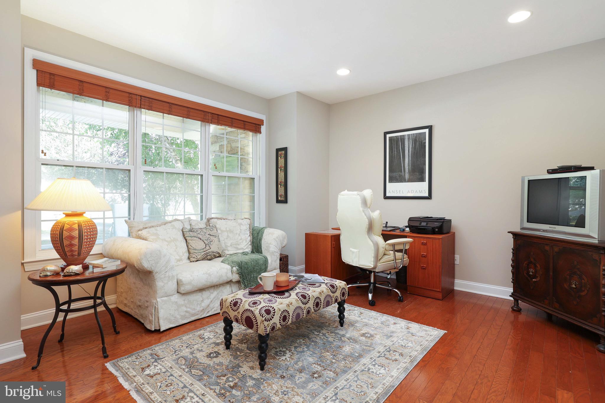 15 Manchester Court Columbus, NJ 08022 - Photo 9 of 80 a living room with furniture or couch and a coffee table