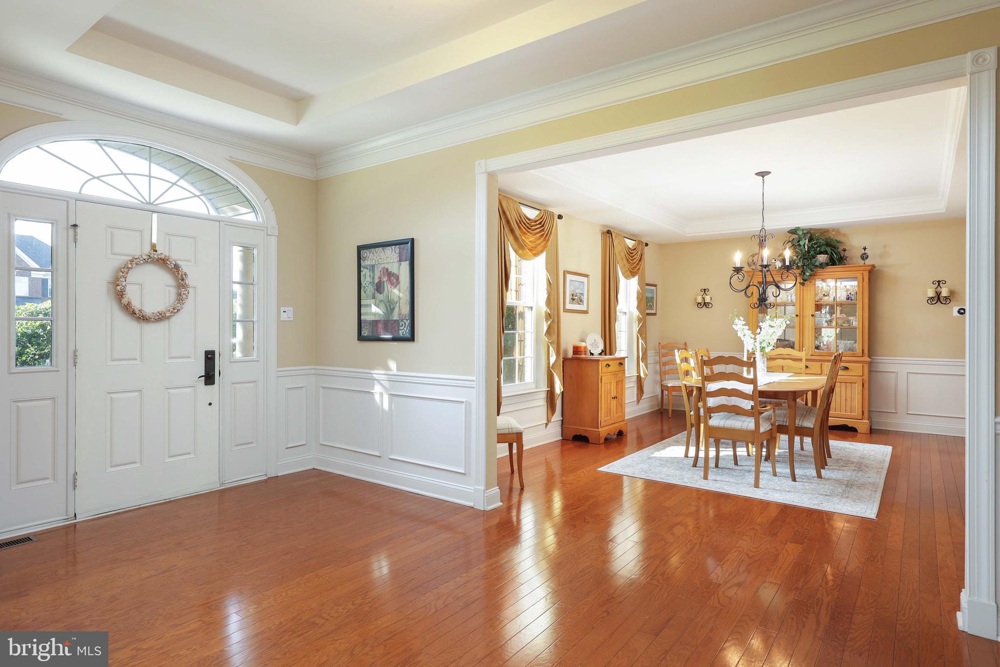 15 Manchester Court Columbus, NJ 08022 - Photo 10 of 80 a view of a livingroom with furniture wooden floor and a chandelier