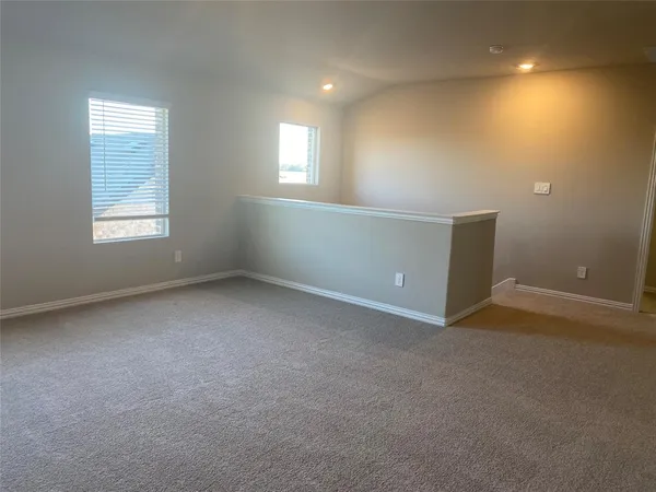 a view of a room with an empty space
