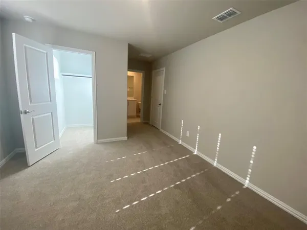 a view of a room that has a window