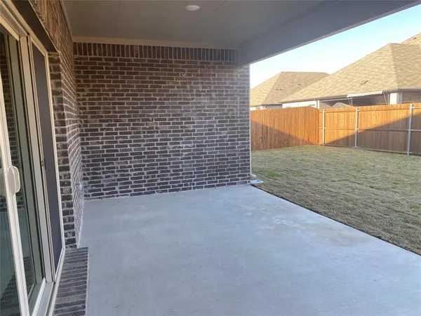 a view of backyard of house