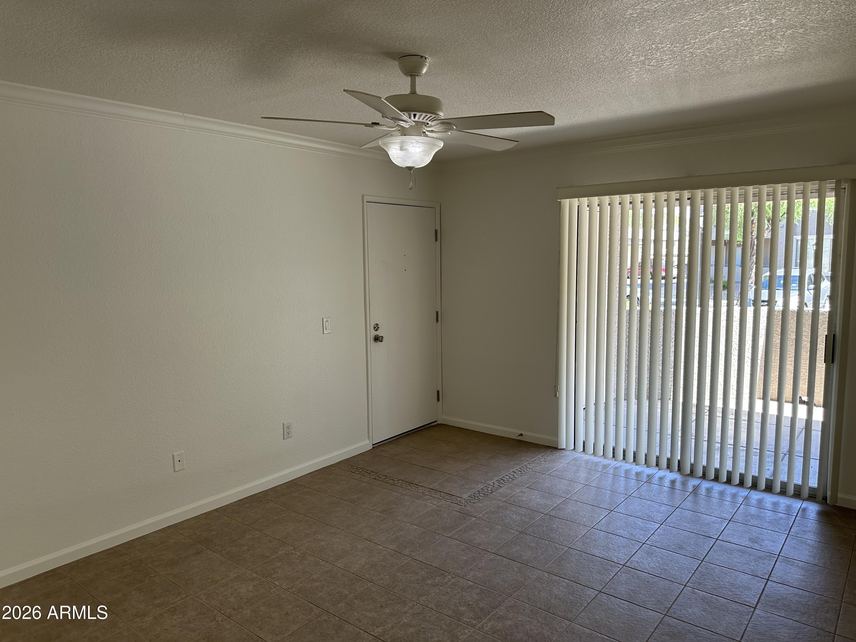 1720 East Thunderbird Road, Unit 1019 Phoenix, AZ 85022 - Photo 21 of 47 a view of a livingroom with a fan