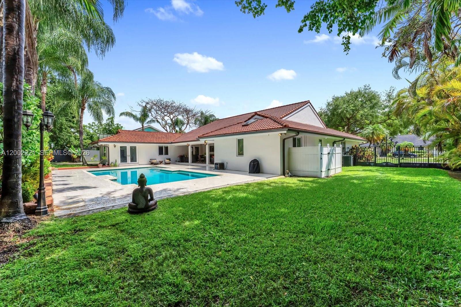 9941 Southwest 143rd Street Miami, FL 33176 - Photo 38 of 48 The backyard has landscape lighting