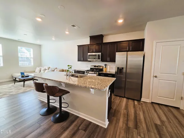 a bedroom with bed and window