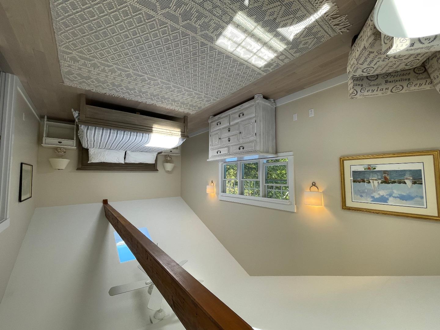 300 Chappaquiddick Road Edgartown, MA 02539 - Photo 13 of 16 a bedroom with a bed and a window