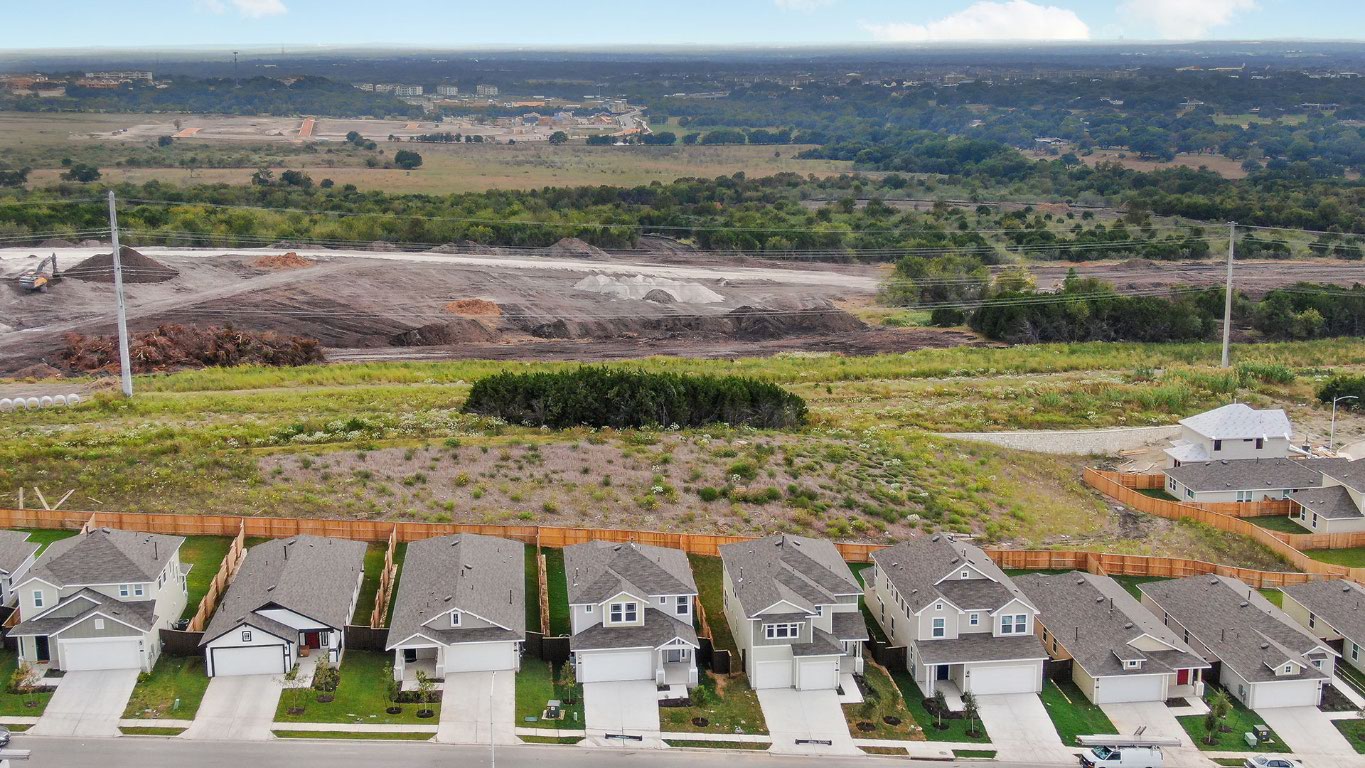 12016 Murano Drive Austin, TX 78747 - Photo 3 of 3 an aerial view of residential houses with outdoor space
