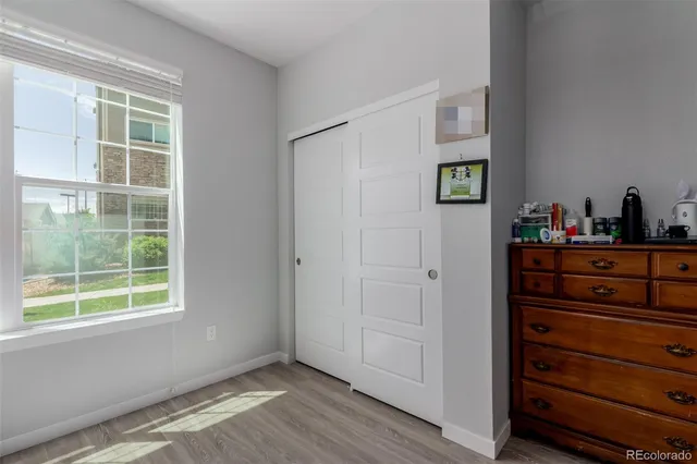 a view of a dresser with wooden floor