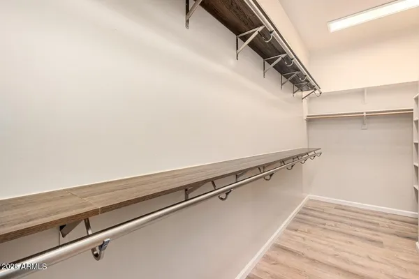 a view of a room with racks on the wall