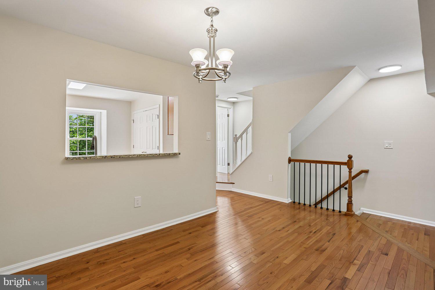 10804 Douglas Avenue Silver Spring, MD 20902 - Photo 13 of 46 Dining room with chandelier