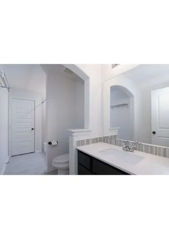 a picture of room with a sink