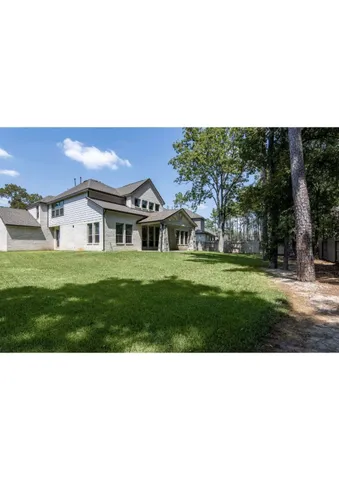 a black and white photo of a house