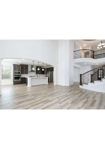 a black and white photo of a living room