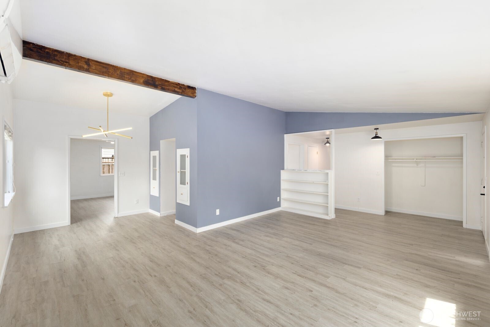 101 161st Street Southeast Bothell, WA 98012 - Photo 7 of 34 a view of an empty room with wooden floor