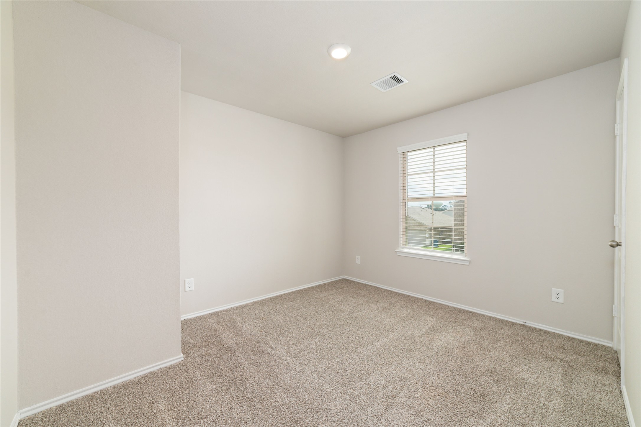 23702 Harrow Field Ln Spring Spring, TX 77373 - Photo 27 of 32 an empty room with windows