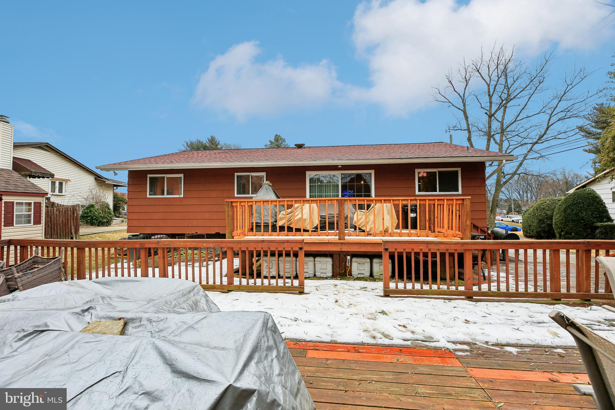 8236 Scotts Level Road Pikesville, MD 21208 - Photo 28 of 35 a view of a house with wooden deck area