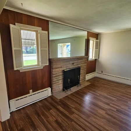 a view of a room with a sink and dishwasher