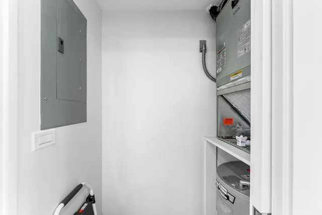 a view of a hallway with a door