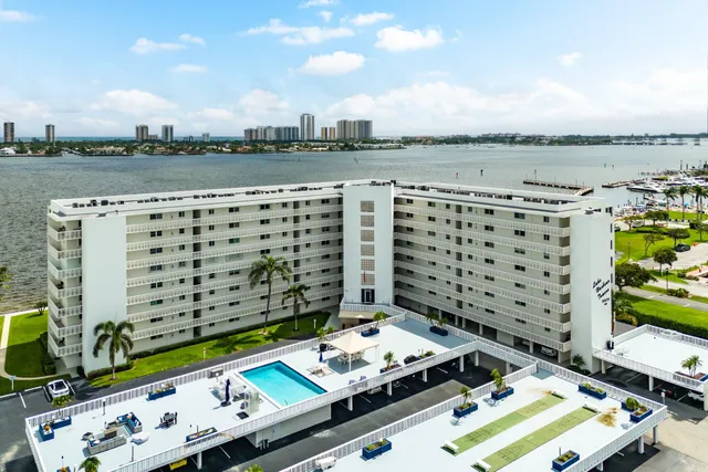 a view of swimming pool with a lake view