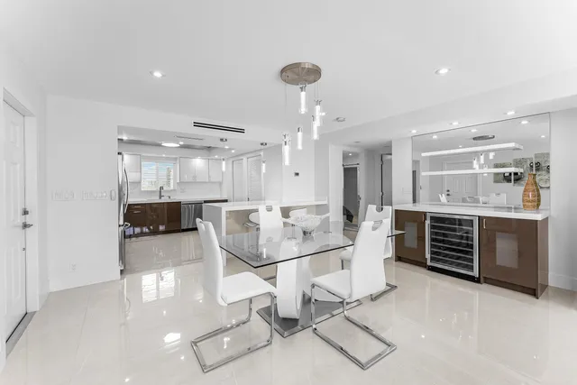 a large room with a large mirror and furniture