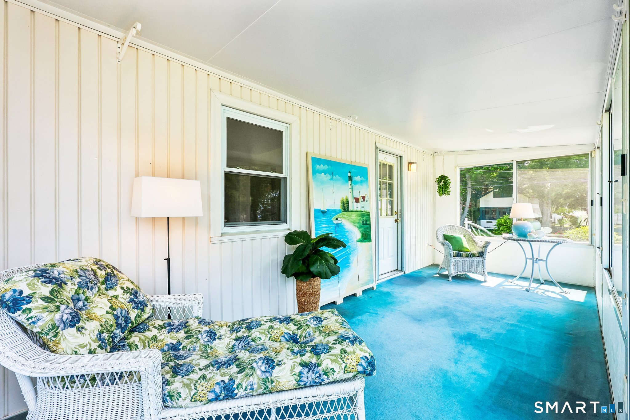 53 Chalker Beach Road Old Saybrook, CT 06475 - Photo 22 of 24 Sun room off of living room. Second entrance into the home.