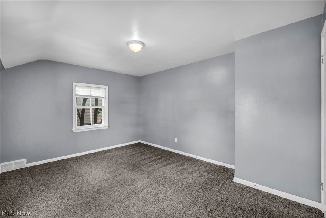 2313 North Taylor Road Cleveland Heights, OH 44112 - Photo 15 of 32 Room featuring grey walls, white trim, a single window, and grey carpet