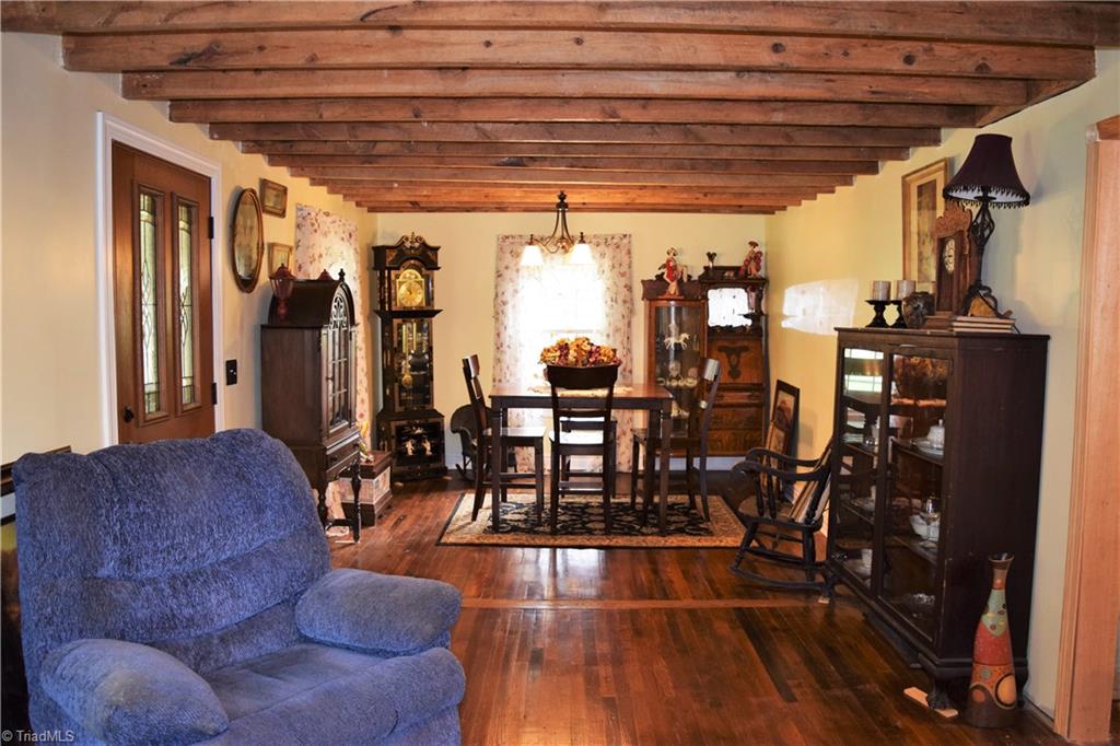 7833 Summerfield Road Summerfield, NC 27358 - Photo 29 of 30 Open floorplan between living room and dining room