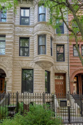 a front view of a house with glass windows