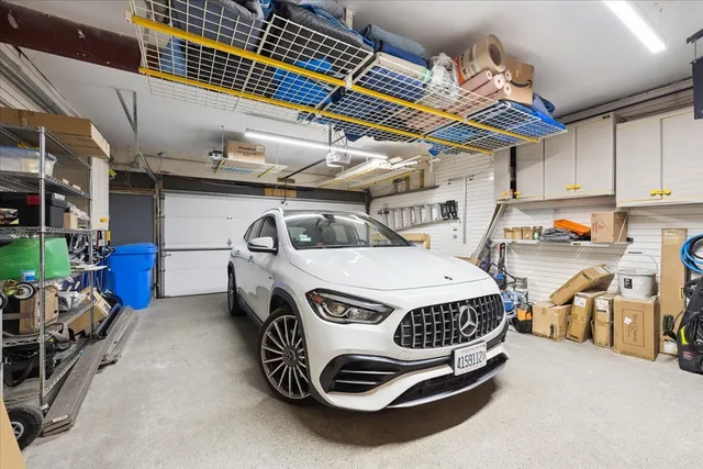 a kitchen with stainless steel appliances granite countertop a stove and a refrigerator