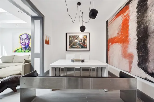 a bathroom with a tub and shower