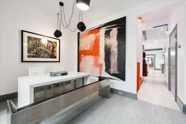 a spacious bathroom with a double vanity sink and a mirror