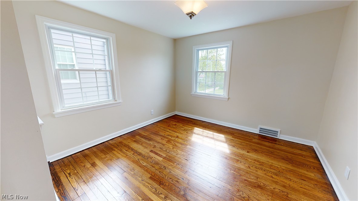 3691 Strathavon Road Cleveland, OH 44120 - Photo 16 of 25 Bedroom 3 with built in shelving. Great for office or nursery.