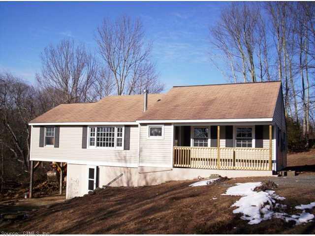 75 Shepard Hill Road Plainfield, CT 06332 - Photo 1 of 1 a front view of a house with a yard